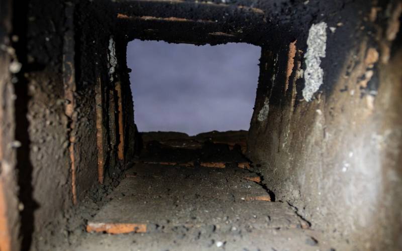 Deteriorated chimney flue liner with cracks